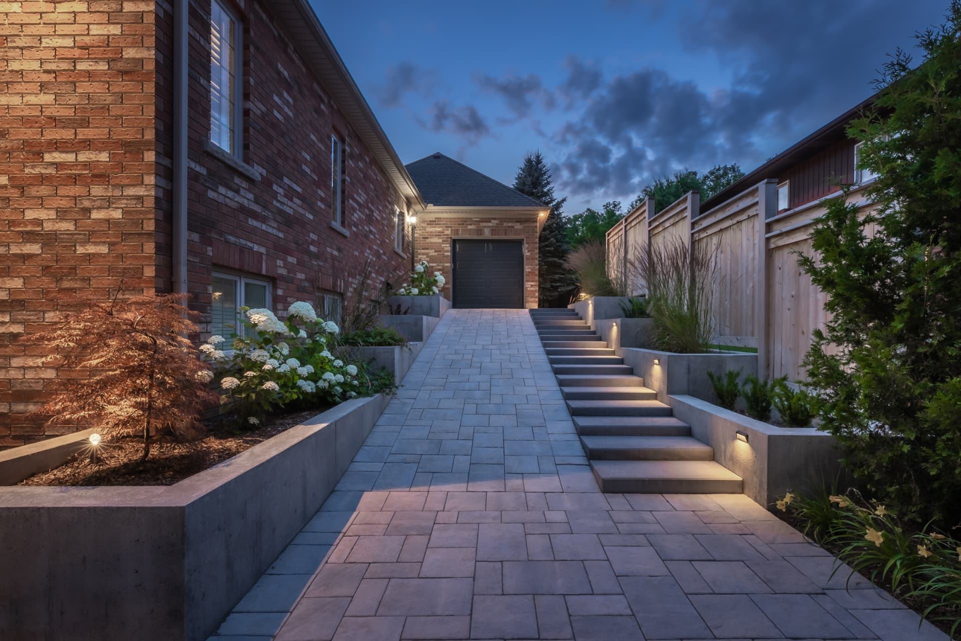 Paver side drive with stone steps