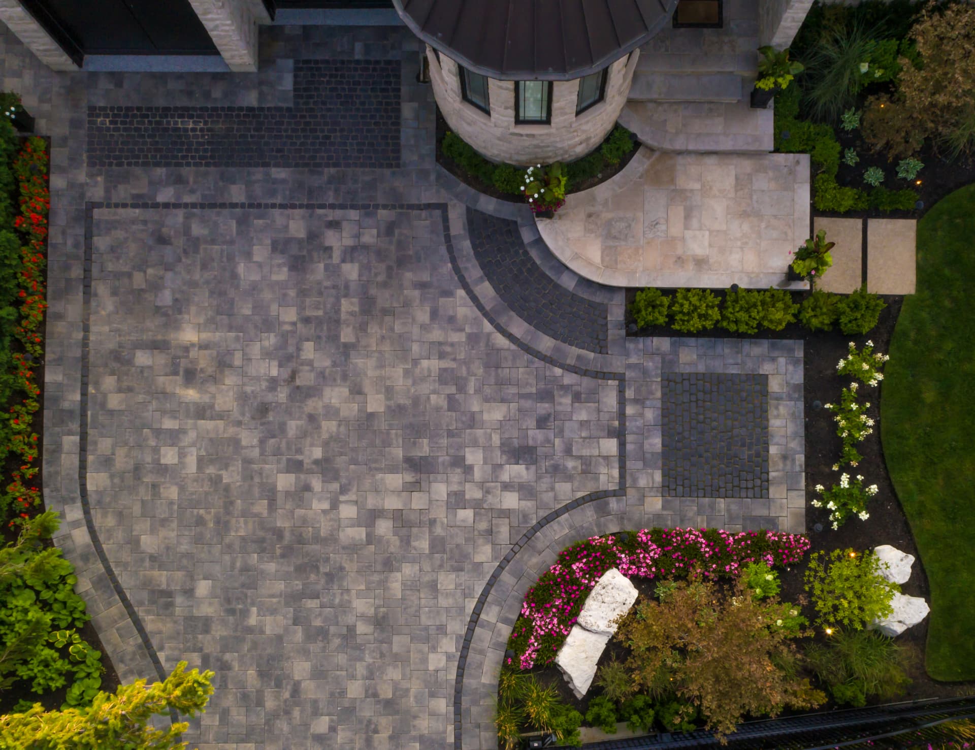 Paver driveway with cobblestone accents