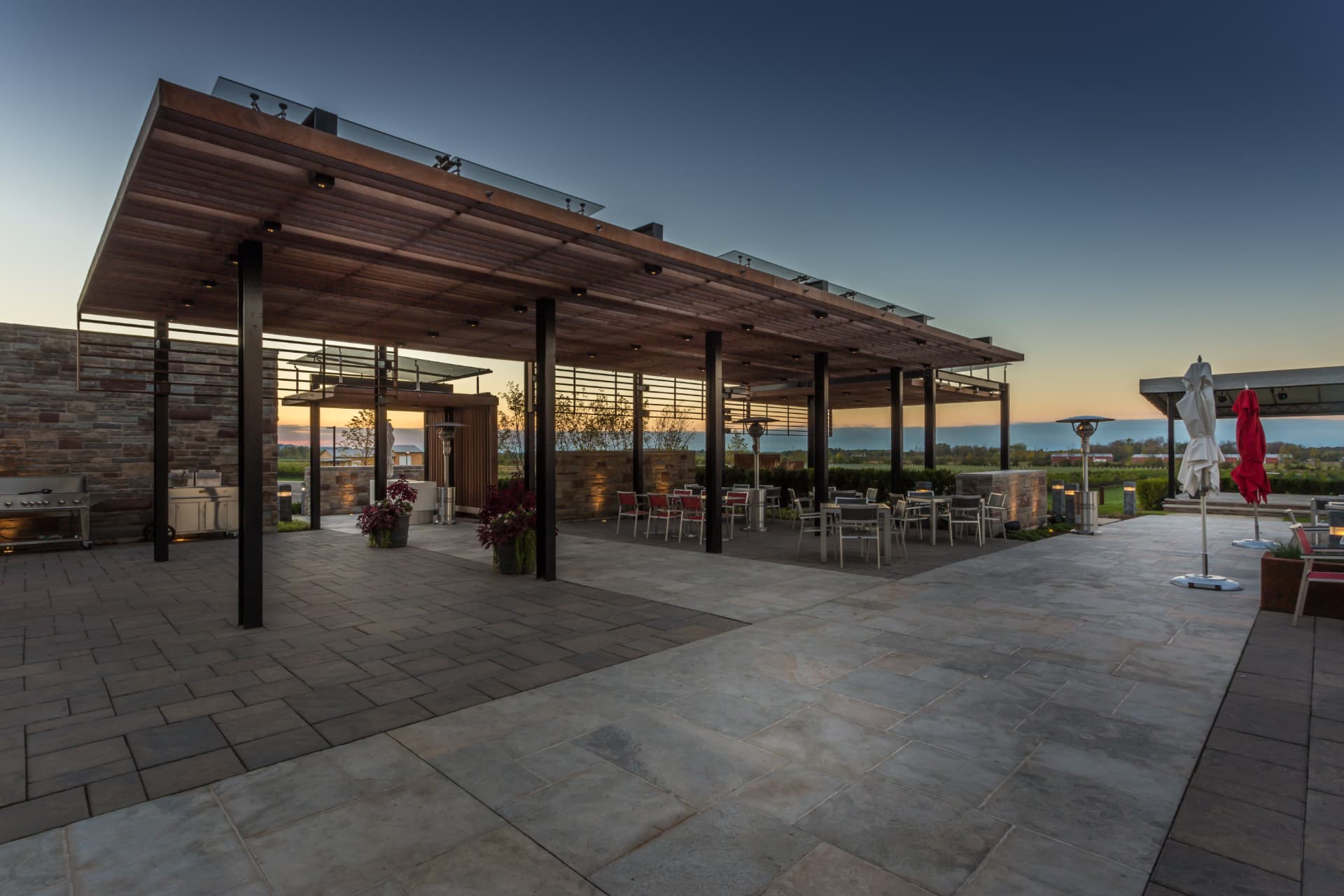 Natural stone slab terrace under an Ipe pavilion